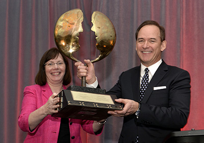 Maryjane Martin, APR, President of CPRS Toronto (left), presents the Toronto CEO Award of Excellence in Public Relations to Phil Soper, President and Chief Executive Officer, Royal LePage Real Estate Services, Wednesday, January 28, 2015, in Toronto. The award was created in 1991 to celebrate the Chief Executive Officer in the Greater Toronto area who best demonstrates personal excellence in the understanding and implementation of public relations practices. The Canadian Press Images PHOTO/CPRS Toronto